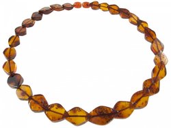 Beads made of figured amber stones