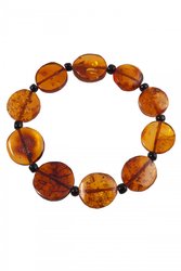Bracelet made of amber stones in the shape of coins