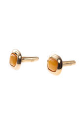 Cufflinks with amber in a silver frame