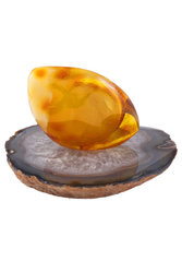 Amber clock on an agate stand