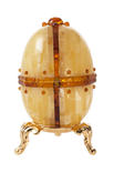 Сувенирное яйцо из янтарных пластин на подставке