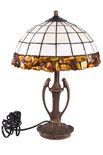 White stained glass and amber lamp