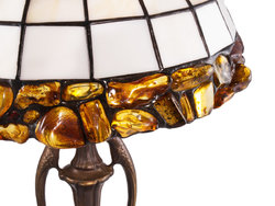 White stained glass and amber lamp