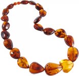Beads made of amber stones in the shape of heart and drops