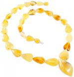 Beads made of light amber “Sun drops”
