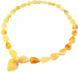 Beads made of light amber “Sun drops”