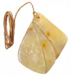Amber pendant on a waxed rope