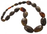 Dark amber stone beads