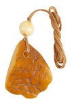 Polished amber pendant with relief carvings