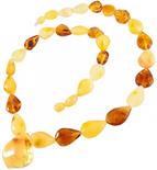 Beads with a pendant of multi-colored amber stones in the shape of drops