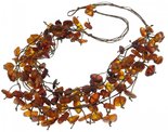 Amber beads made of stones on waxed thread