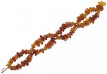 Плетений бурштиновий браслет