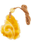 Carved amber pendant “Goldfish”