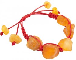 Amulet bracelet with red thread and polished honey-colored amber