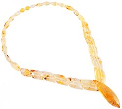 Bead necklace made of figured translucent amber stones