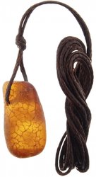 Healing pendant made of polished amber on a waxed thread