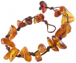 Braided bracelet made of polished amber stones