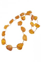 Beads-string made of honey-colored amber stones