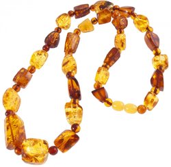 Amber beads with alternating figured stones and balls