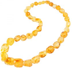 Amber beads made of light translucent polished stones