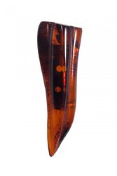 Brooch carved from amber stone