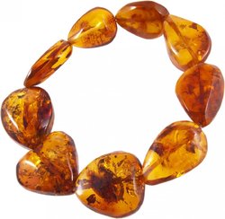 Bracelet made of amber stones in the shape of a heart and a drop