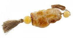 Pendant “Owl” on a wax rope with a tassel