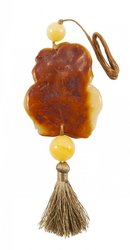 Pendant “Owl” on a wax rope with a tassel
