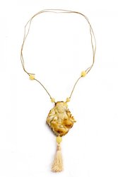 Buddha pendant on a wax rope with a tassel