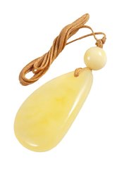 Pendant with polished stone and amber ball
