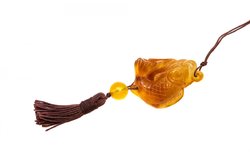 Pendant “Fish” on a wax rope with a tassel