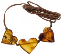 Pendant “3 hearts” on a wax rope