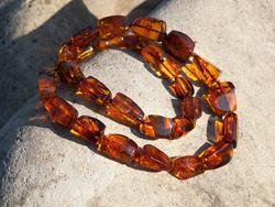 Amber beads with beads