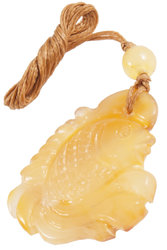 Carved amber pendant “Goldfish”