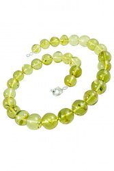Beads made from greenish amber beads