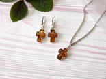 Cross with carved amber stone