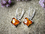 Silver earrings with amber “Butterflies”