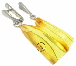 Сережки бурштинові в фігурному кріпленні з інклюзом