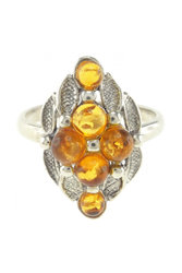 Серебряное кольцо с янтарными вставками медового цвета